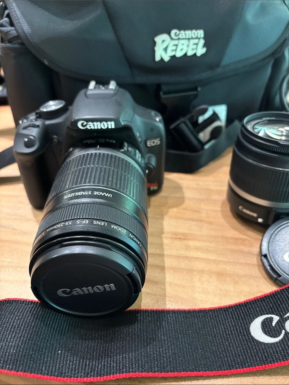 Canon Rebel DSLR with Black Camera Bag, Straps and Lenses